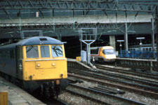 86 240 and APT-P wait departure from Euston on Monday 28 April 1985 © Colin Brooks